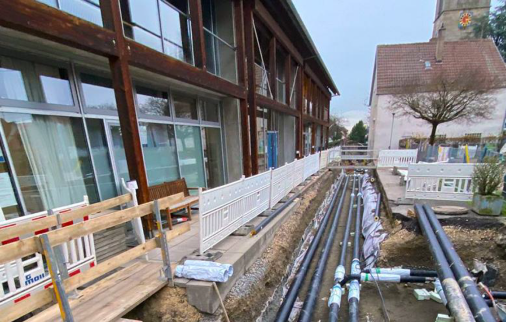 Distric heating using hybrid solar panels. Shows the thermal pipes of a district heating.